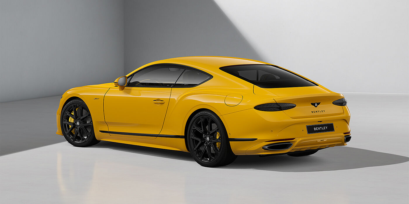 Bentley Düsseldorf Bentley Continental GT Speed coupe in Monaco Yellow paint and 22" Ten spoke sport wheels - rear 3/4