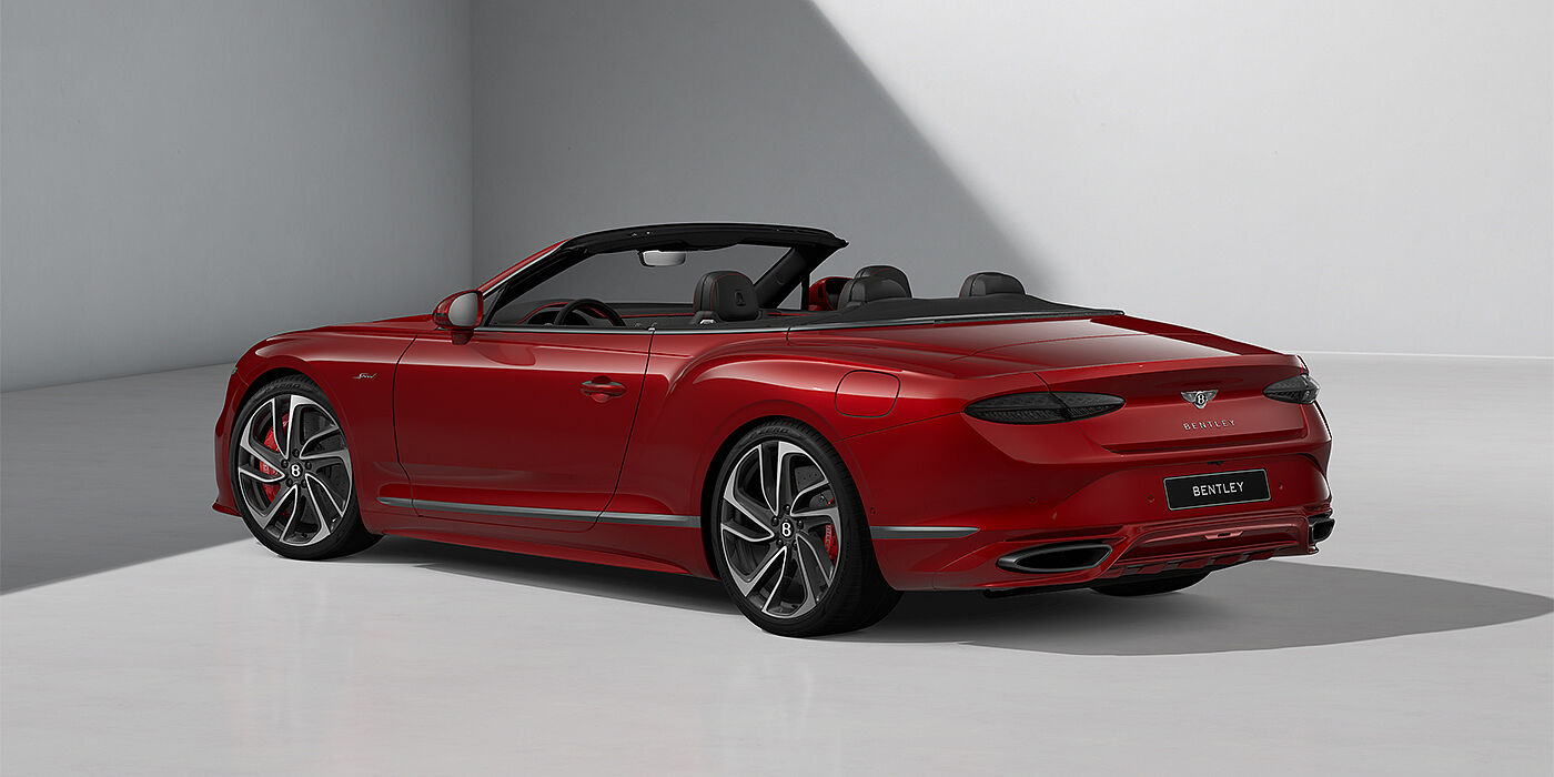 Bentley Düsseldorf Bentley Continental GTC Speed convertible in Dragon Red paint and 22" swept spoke wheels - rear 3/4