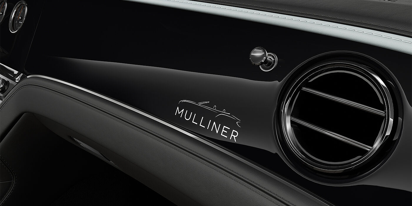 Bentley Düsseldorf Bentley Continental GTC Mulliner coupe veneer detail in Grand Black veneer with Diamond Milled console