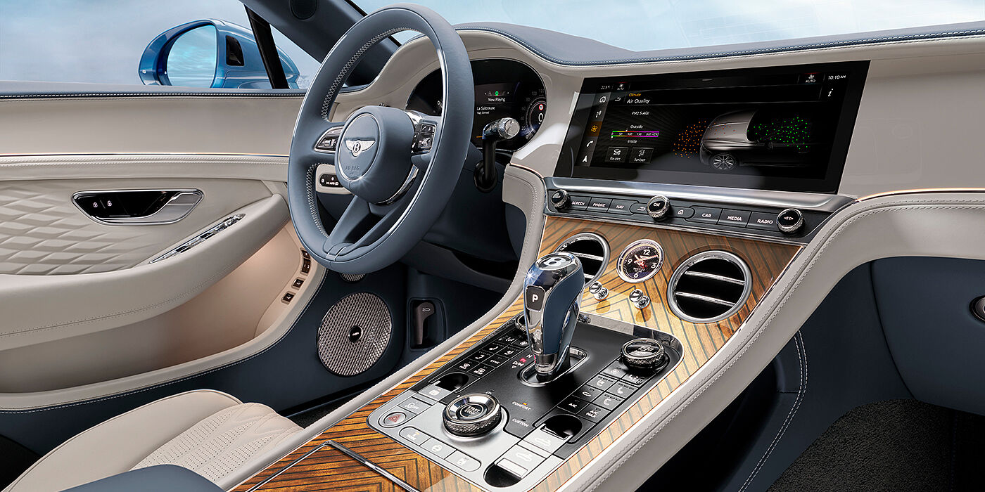 Bentley Düsseldorf New Bentley Continental GTC Azure convertible interior front cabin view with Linen and Brunel hides and Piano Linen by Mulliner veneer featuring centre console and centre MMI screen