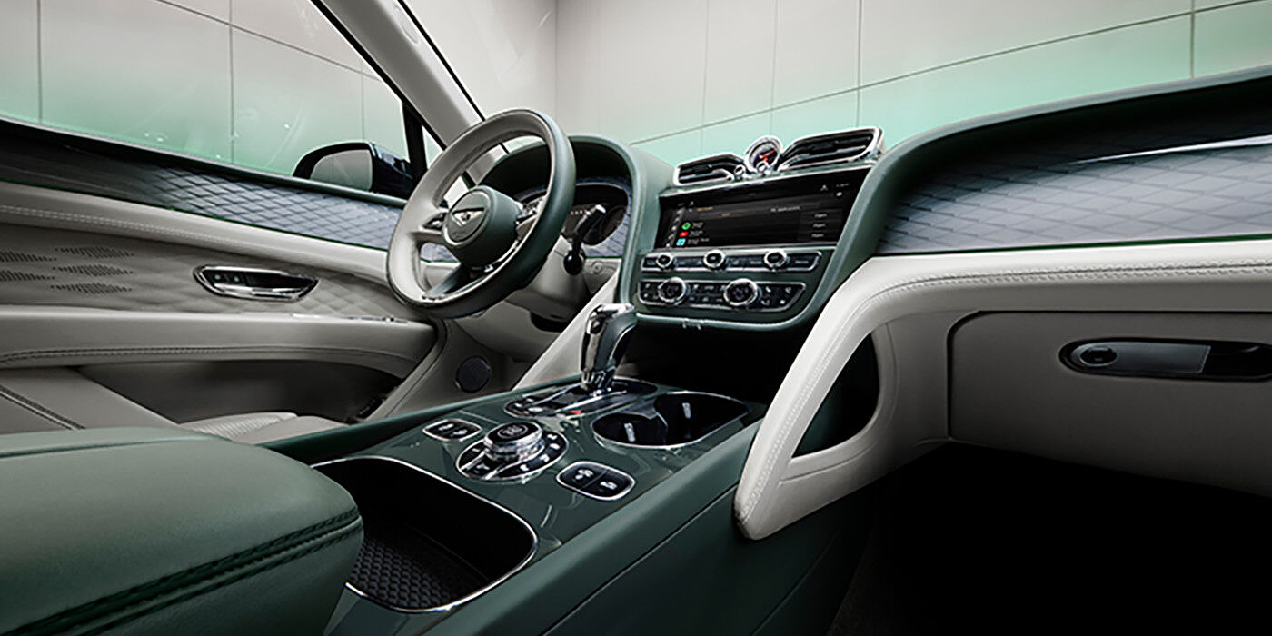 Bentley Düsseldorf Bentley Bentayga Atelier Edition SUV front interior in Portland and Cumbrian Green hides with Dark Tint Diamond Brushed Aluminium veneer