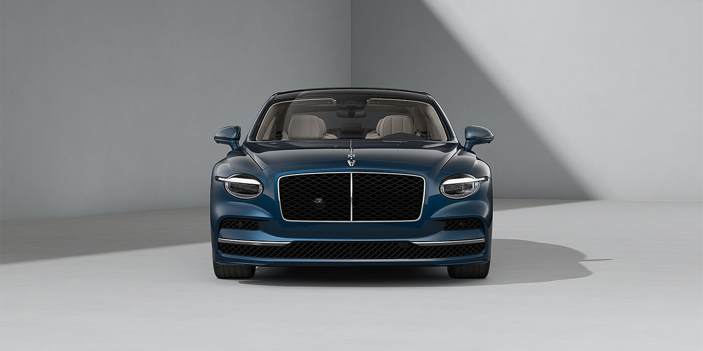 Bentley Düsseldorf New Bentley Flying Spur sedan in Marlin blue paint full front with 22" Ten Spoke Black Painted and Bright Machined wheels