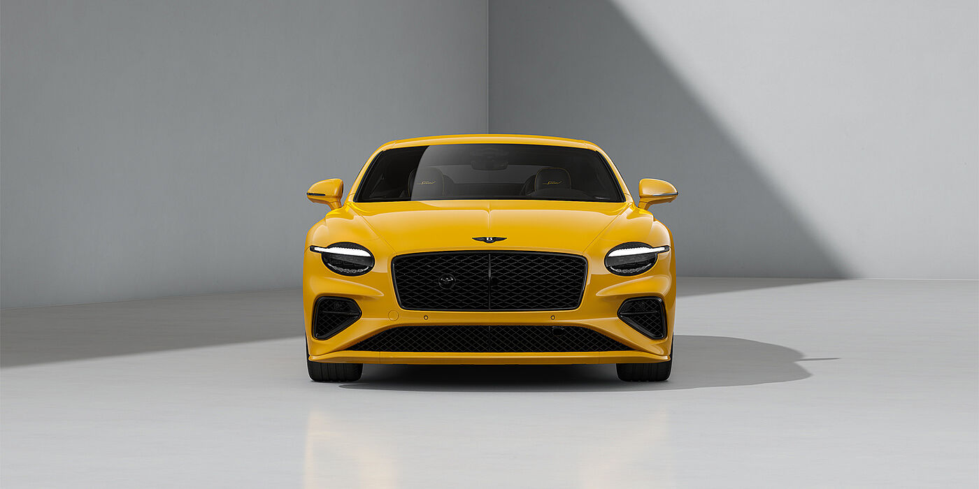 Bentley Düsseldorf Bentley Continental GT Speed coupe in Monaco Yellow paint and 22" Ten spoke sport wheels - full front