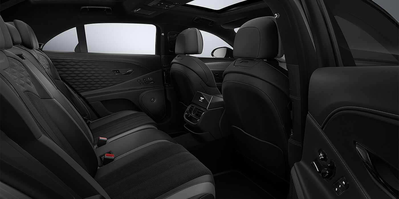 Bentley Düsseldorf New Bentley Flying Spur Speed sedan rear interior in Gravity Grey  and Beluga Black hides with Diamond Brushed Dark Tint Aluminium veneer