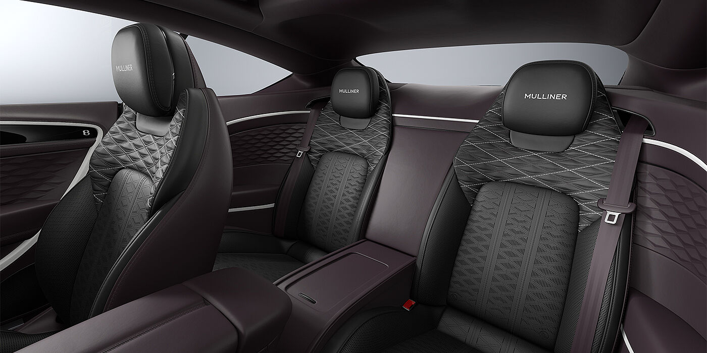 Bentley Düsseldorf Bentley Continental GT Mulliner coupe rear interior in Beluga black and Damson hides with white accent hide