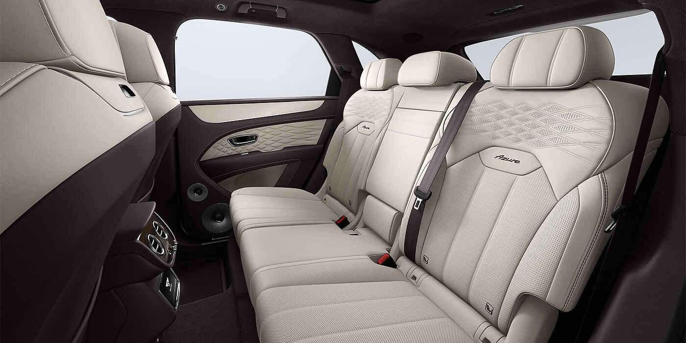 Bentley Düsseldorf Bentley Bentayga Azure SUV rear interior in Linen and Damson hides and Azure seat stitching