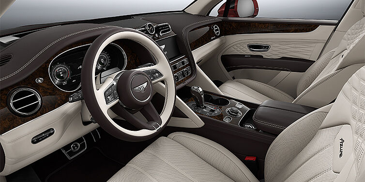 Bentley Düsseldorf Bentley Bentayga EWB Azure SUV front interior in Linen and Burnt Oak hides with Dark Stained Burr Walnut veneer