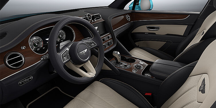 Bentley Düsseldorf Bentley Bentayga EWB SUV front interior in Portland and Imperial Blue hides with Crown Cut Walnut veneer
