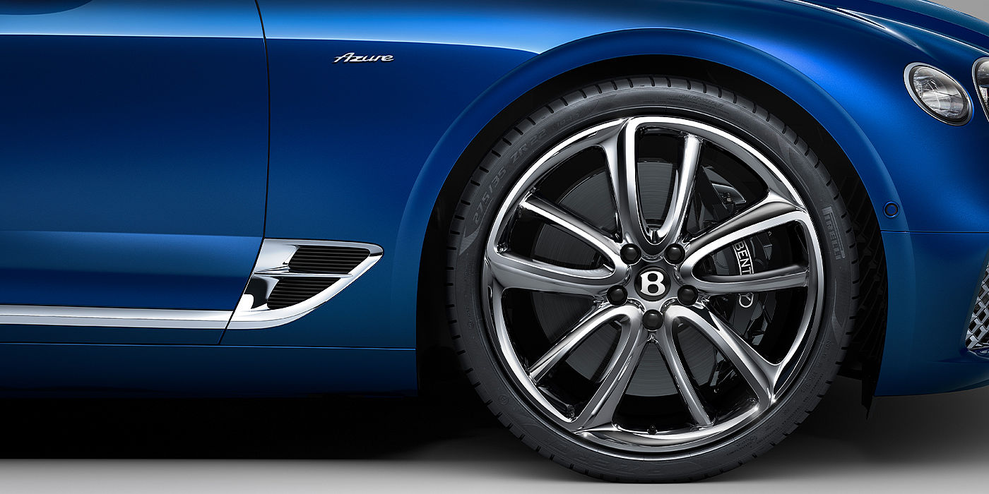Bentley Düsseldorf Bentley Continental GTC Azure convertible in Sequin Blue paint side profile with Azure badge close up