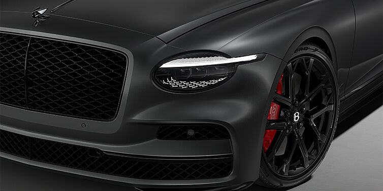 Bentley Düsseldorf New Bentley Flying Spur S sedan head lamp against Anthracite Satin paint with  22" Sports wheel