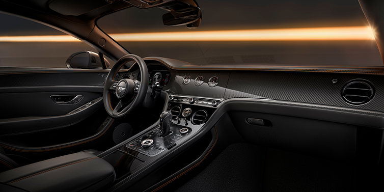 Bentley Düsseldorf Bentley Continental GT Black Edition coupe front interior with Beluga black hide and High Gloss Carbon Fibre veneer