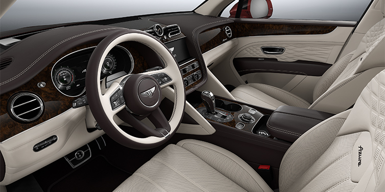 Bentley Düsseldorf Bentley Bentayga EWB Azure SUV front interior in Linen and Burnt Oak hides with Dark Stained Burr Walnut veneer