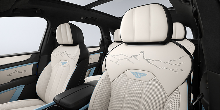 Bentley Düsseldorf Bentley Bentayga Artenara Edition SUV front seats in Linen and Beluga Black hides with Light Blue accents and Artenara stitch detail