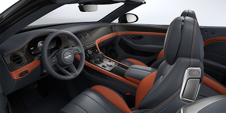 Bentley Düsseldorf Bentley Continental GTC S convertible interior in Newmarket Tan and Beluga Black hides with Carbon Fibre veneer