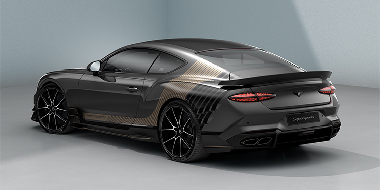 Bentley Düsseldorf Bentley Supersports rear three quarter in "Nightfall Design theme with Anthracite paint and Beluga black and Camel brown paint stripes across the rear haunch.