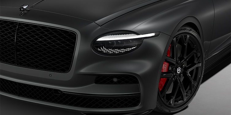 Bentley Düsseldorf New Bentley Flying Spur S sedan head lamp against Anthracite Satin paint with  22" Sports wheel