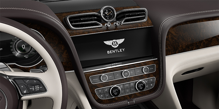 Bentley Düsseldorf Bentley Bentayga EWB Azure SUV centre console detail showing Bentley Wings